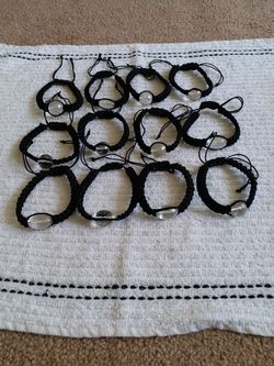 CRYSTAL ROUND STONE WITH BLACK DORI BRACELETS