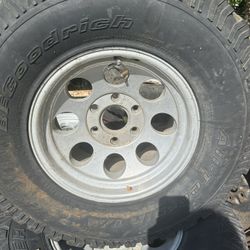 Three Used Tires And Wheels 
