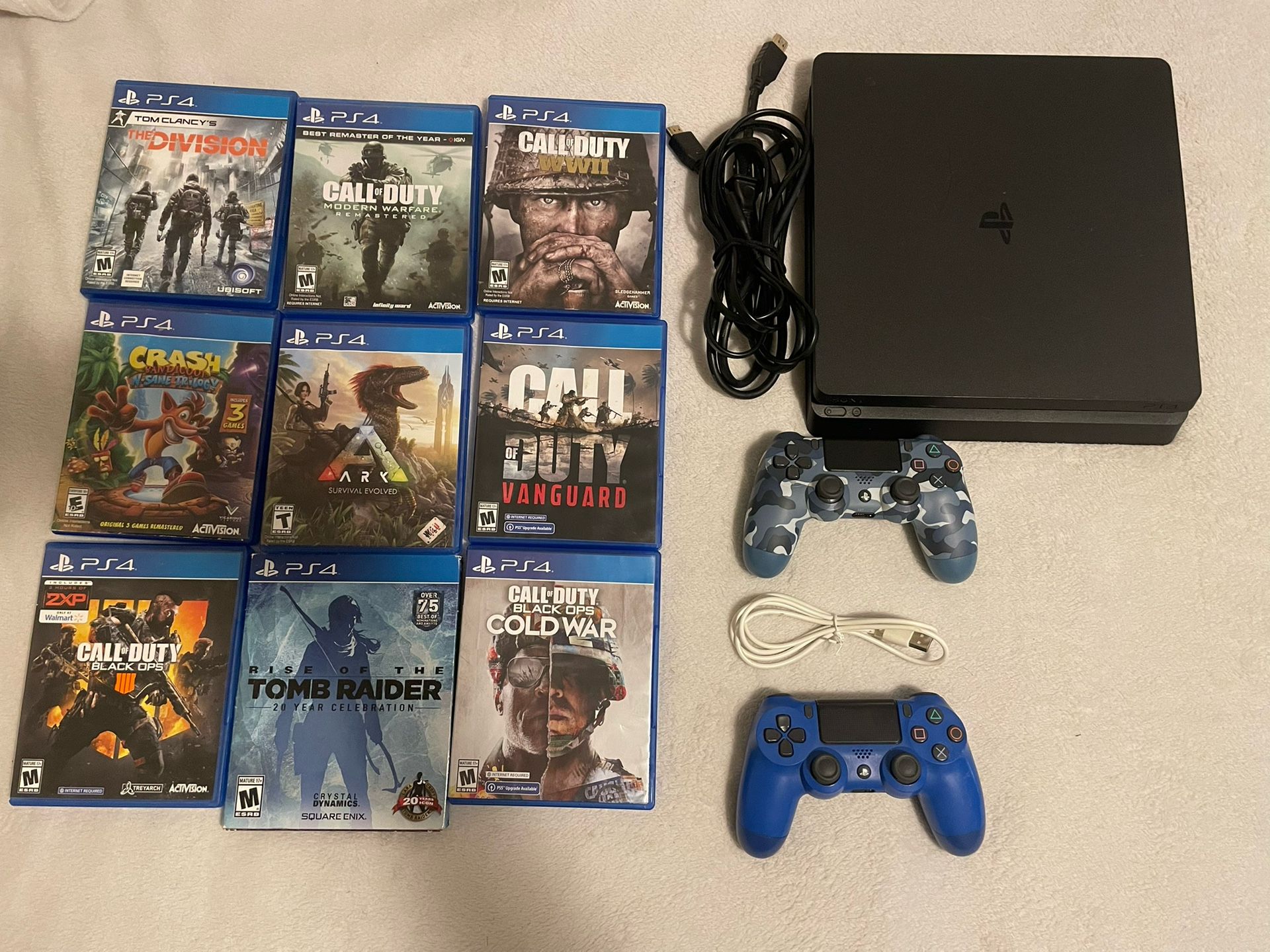 PS4 Slim + 2 Controllers + 8 Games – Ready to Play!
