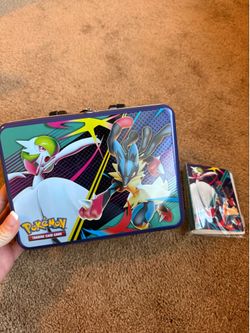 Pokemon lunchbox and mini card binder