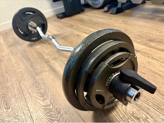 Olympic  Curl Bard & Brand NEW  Cast Iron Weight Plates 25s, 10s and 5s . Total: 97 lbs