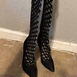 Black see-through boots heels