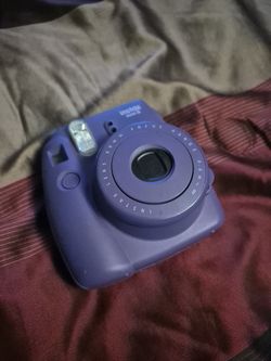 Used Insta Mini 8 Polaroid camera and protector