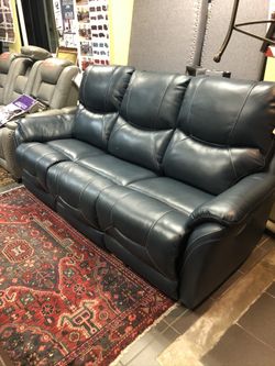 Genuine leather power reclining sofa