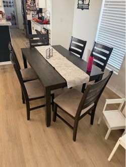 Table and chairs roughly 3ft wide and 5ft long
