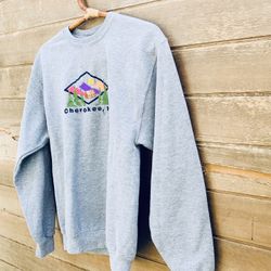 Vintage Cherokee, NC Grey sweater. Approximately measurement Waist 19 inches Pit to pit 18 inches Length 25 inches E
