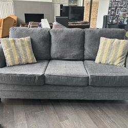 light Gray sofa for sale. barely Used Like New.