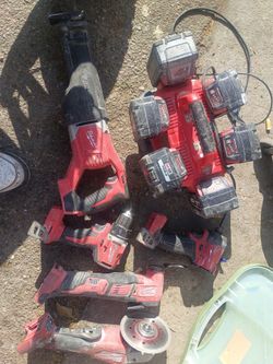 Milwaukee Drills, Sawzall Batteries Charging station n Batterries
