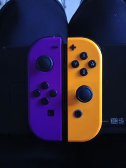2 Sets of Official Nintendo Switch Joy-Cons (Purple/Orange & Red/Blue)