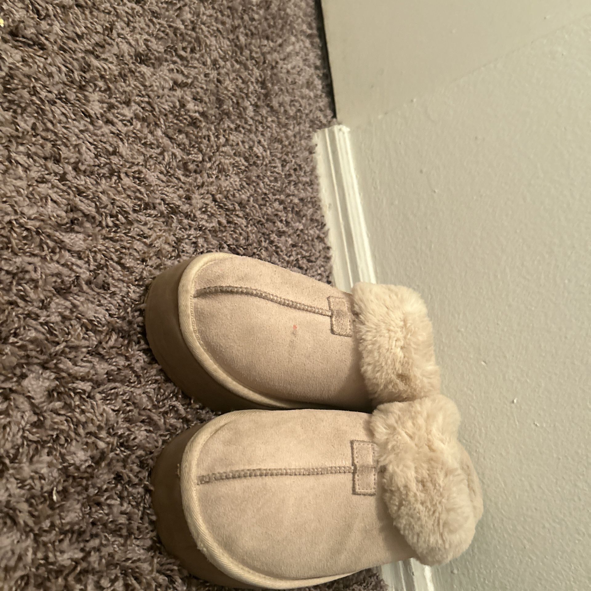 Off-branded cream platformed UGG slippers