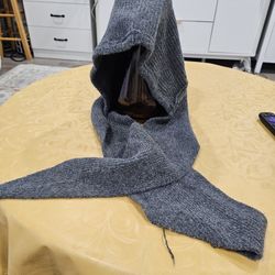 New, never used Soft Wool knit hat and attached scarf. 