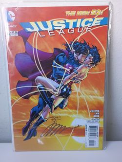 DC Comics Justice League #12 Signed Jim Lee COA Comic Book 2012The product is a signed DC Comics Justice League #12 comic book from 2012 by artist Jim