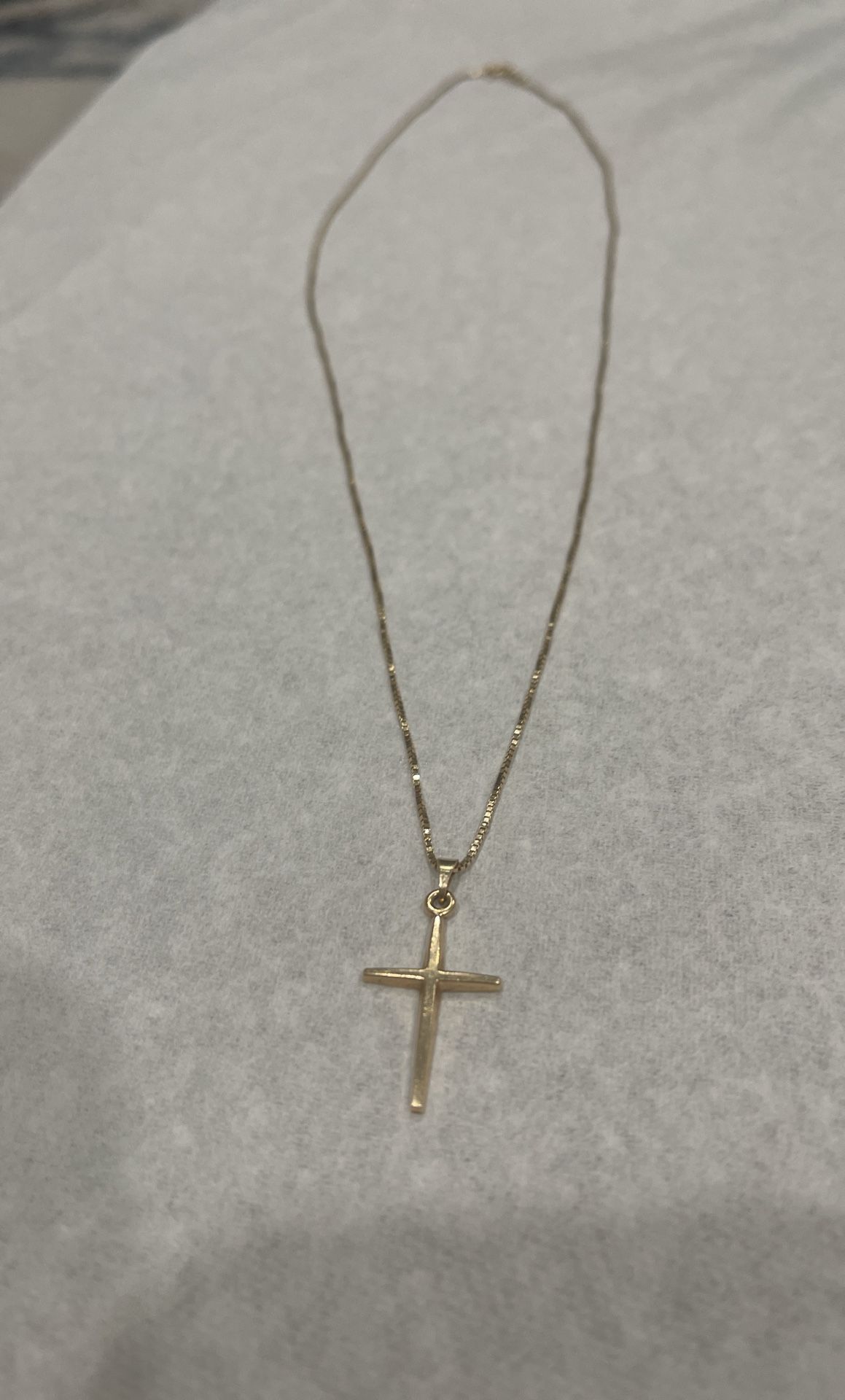 14k Gold necklace with a cross