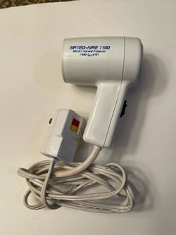 Compact Travel Hair Dryer with Two Settings, Safety Reset Switch