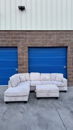 FREE DELIVERY cream sectional sofa couch with ottoman