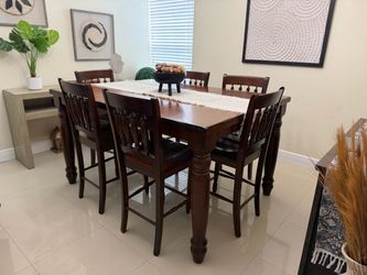 Dinning set with leaf 6 chairs (high top) plus buffet and entry table all for 1200 for all 3 pieces obo
