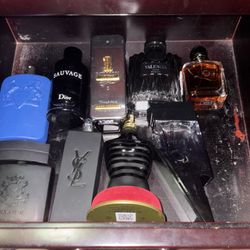 9  Bottles Of Men’s Name Brand Cologne 