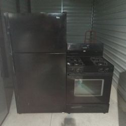 Black Admiral And Whirlpool Fridge And Stove