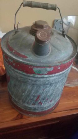 Antique oil can with cap