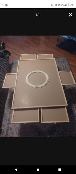 Spinning puzzle/game board with drawers