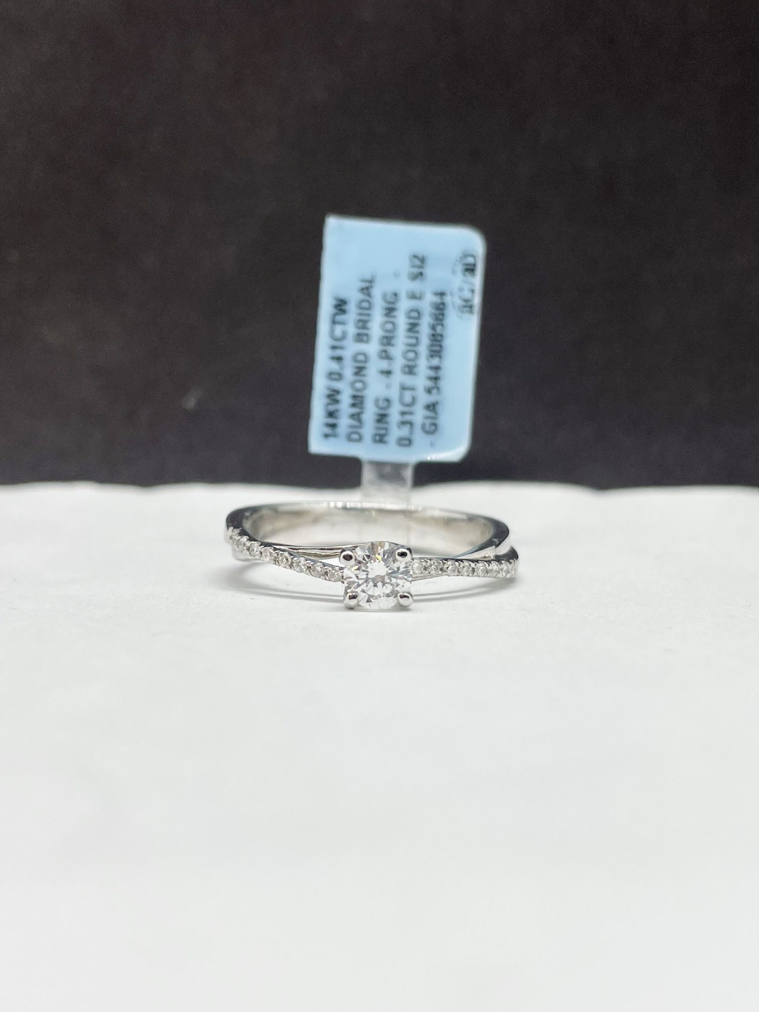 14k solid white gold engagement ring with .31 ct diamond