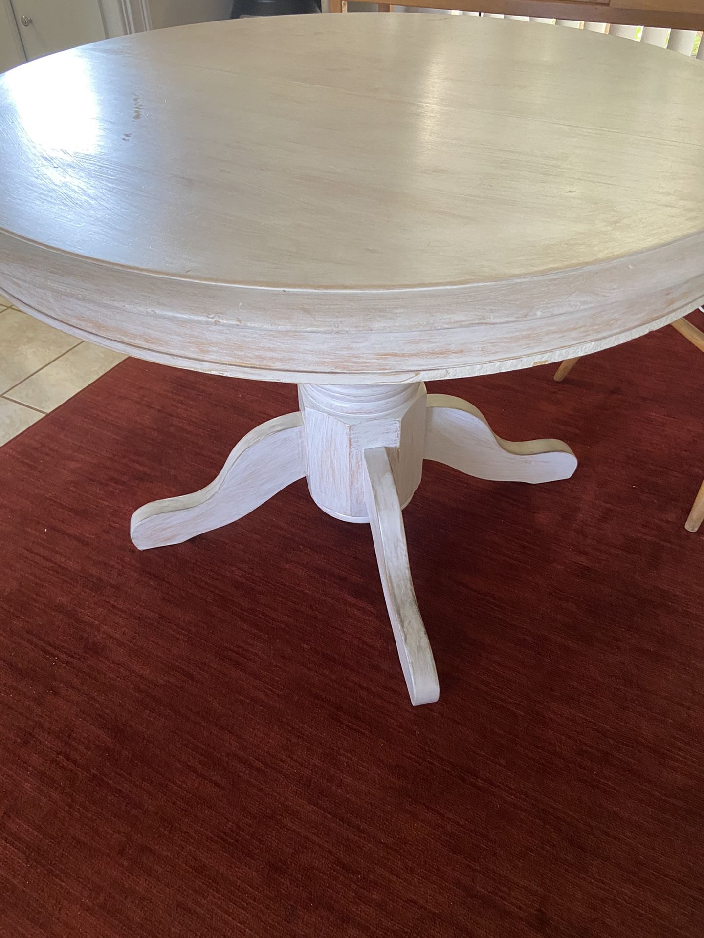 Round wood dining table