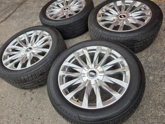 22" Cadillac escalade factory wheels and tires