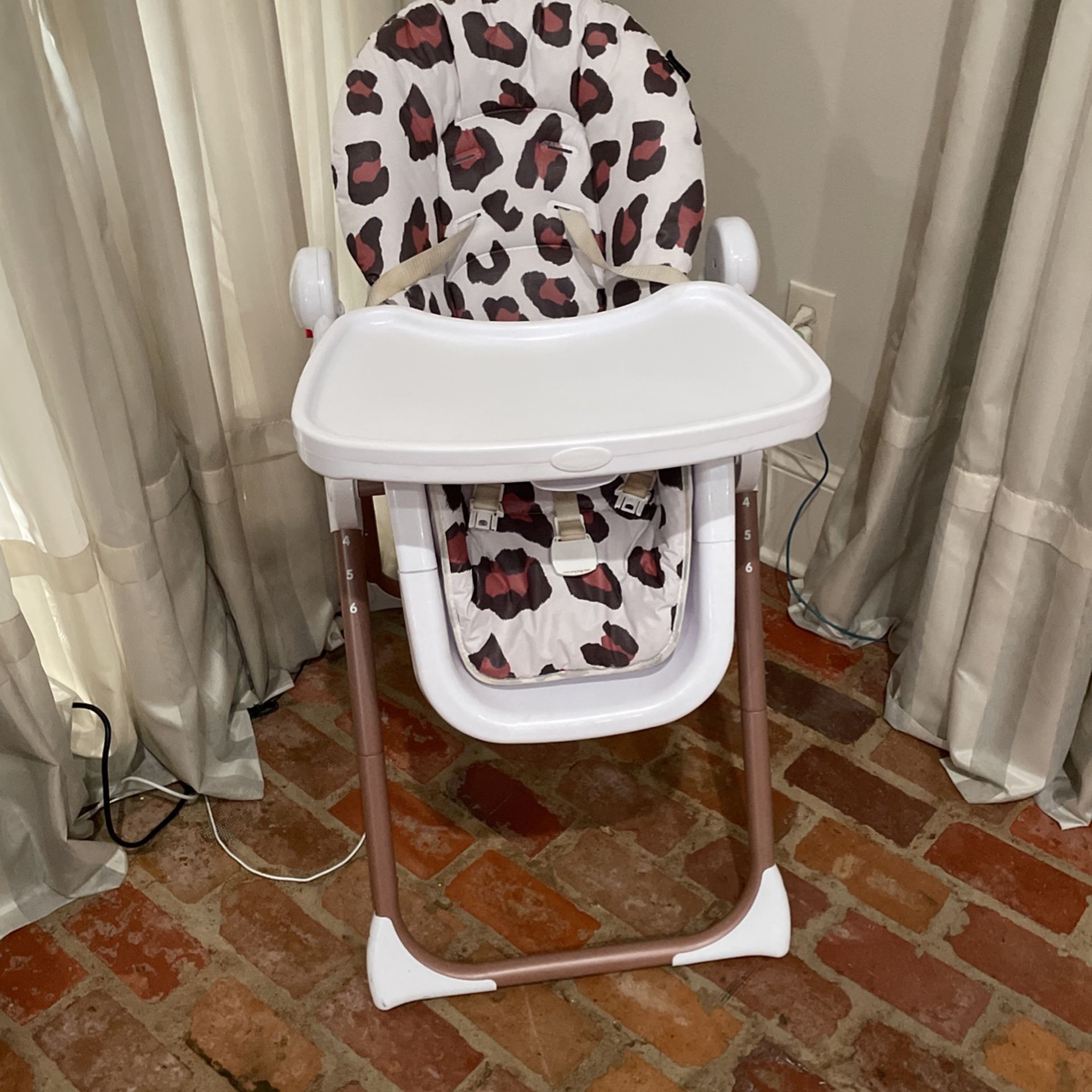 Leopard print high chair