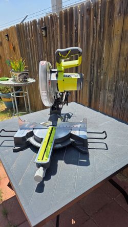 RYOBI 10 INCH MITER SAW, STAND USED IN GREAT CONDITION