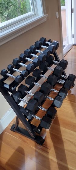 RUBBER HEX DUMBBELLS SET:
  5-50lb. WITH THE RACK.