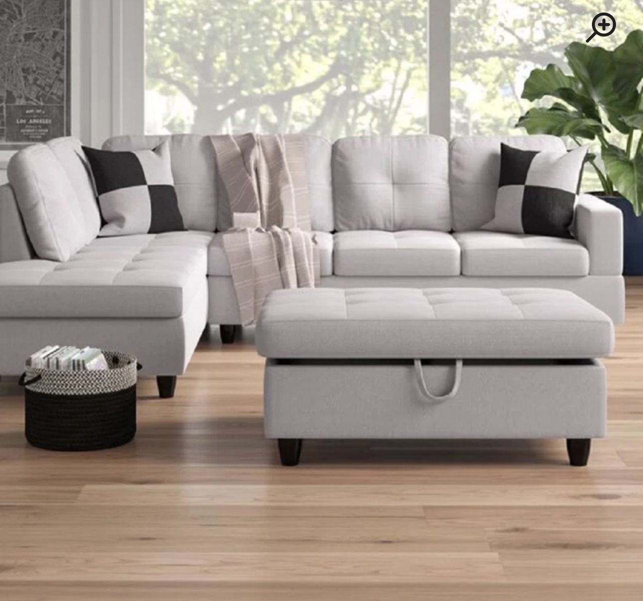 Light gray sectional couch with ottoman