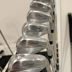Brand new Titleist T250 4- PW with AMT Black Stiff flex