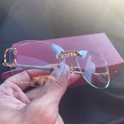 Cartier Glasses gold arms