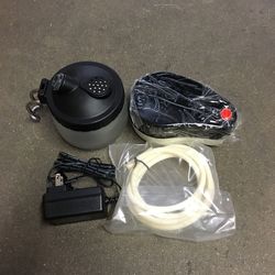 New in box $20 mini airbrush compressor with glass cleaning pot air hose