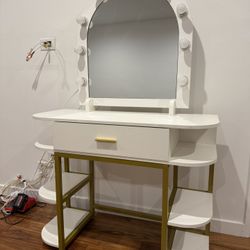 Vanity desk with mirror and lights