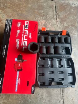Milwaukee 1 inch impact with sockets