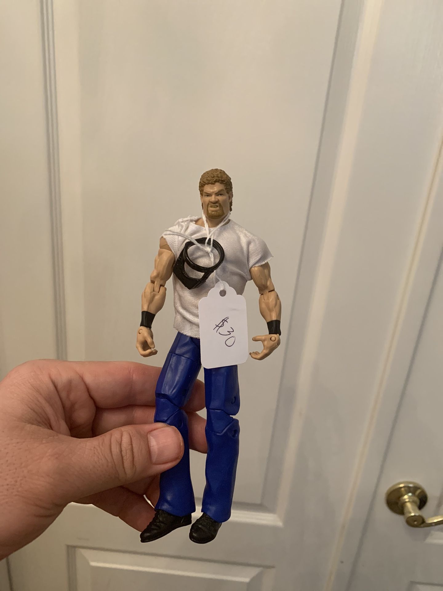 WWE action figure Dr. Isaac Yankem, D.D.S. Aka Kane