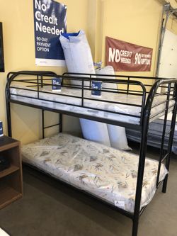 Bunk bed with mattresses