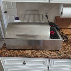 KENYON GUSTOM  120 V ELECTRIC GRILL new is worth $1,143 if you have any doubt check it out on Amazon