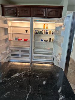 Sub Zero Refrigerator w/ Multiple compartments.