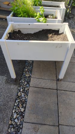 Raised flower bed with wheels