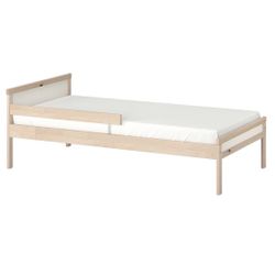 Sturdy IKEA wooden toddler bed frame with mattress