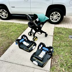 Doona Infant Car Seat & Stroller – Includes 2 Bases