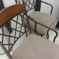 Two Swivel Iron Counter Chairs