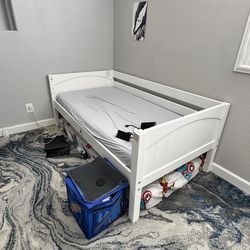 Three twin size beds with mattresses