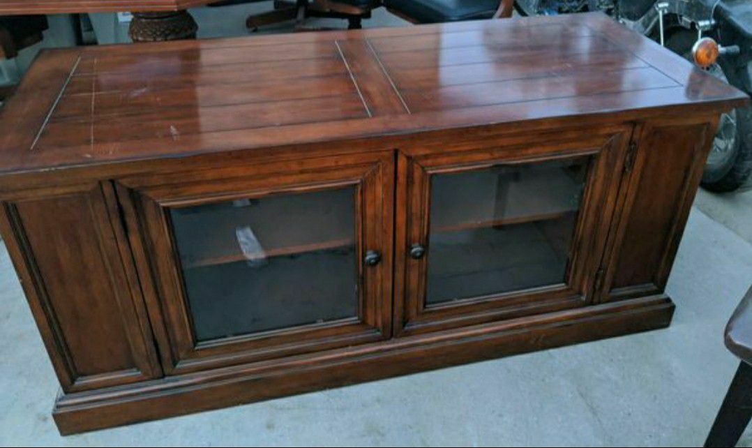 Entertainment center with glass