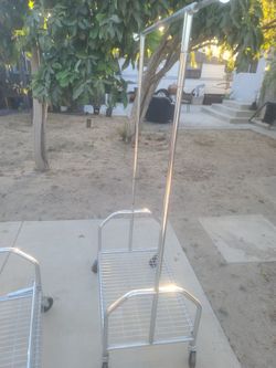 Metal clothes hangers with wheels