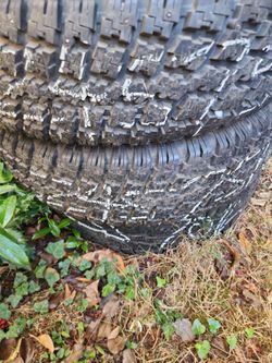 245/75/16 matching pair of studded snow tires