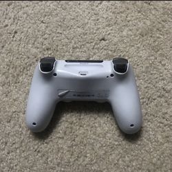 White Dualshock Playstation 4 Controller.
