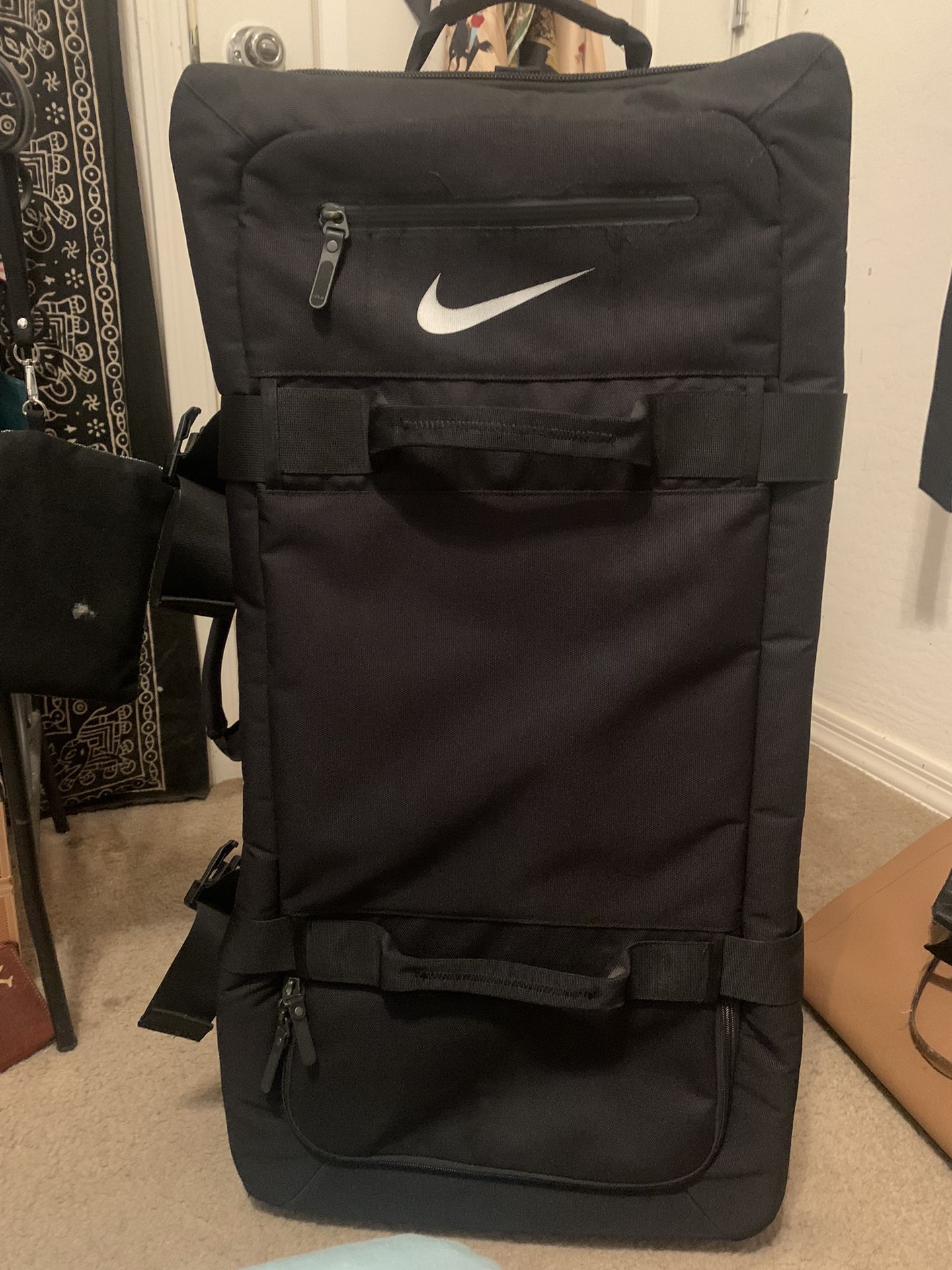 nike backpack bag for travel and wheels Track (27L) Nike Track Backpack The Nike Travel Suitcase:, 